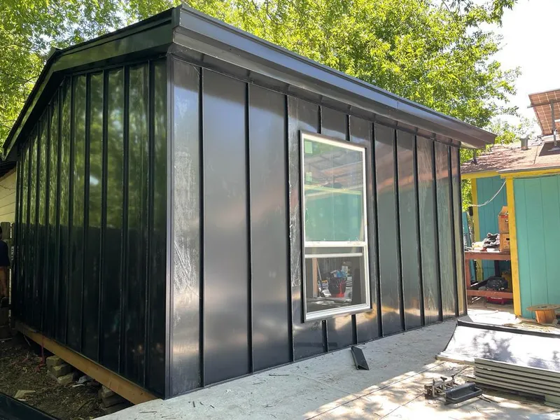 Black standing seam metal wall panels for Roof Inspection in Verdigris