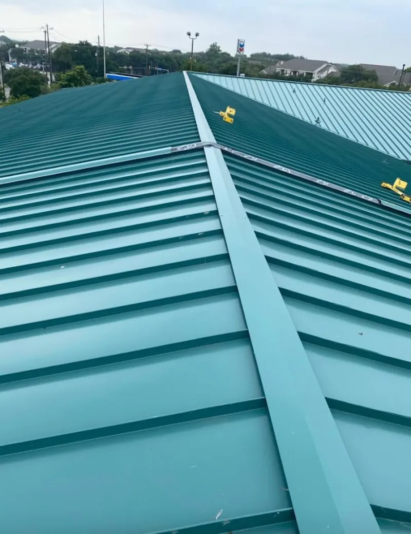 Green commercial metal roof ridge and valley for Metal Roof Repair in Verdigris